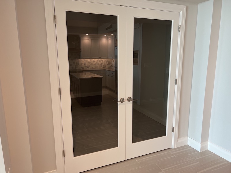 Sunset Pointe Luxury Condo Doors - Integrated Openings Solutions