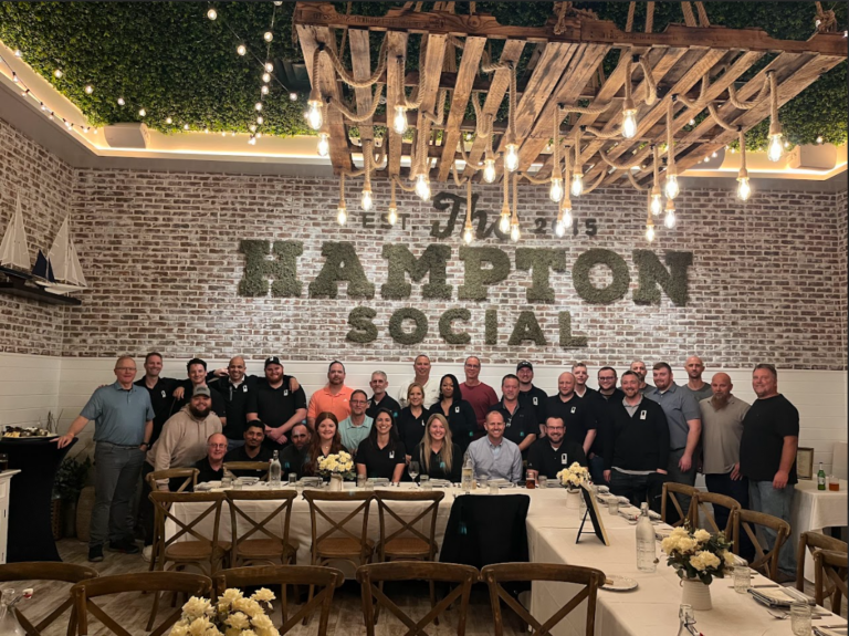 IOS leaders from all divisions enjoy a meal at the Hampton Social in Naples, Fl