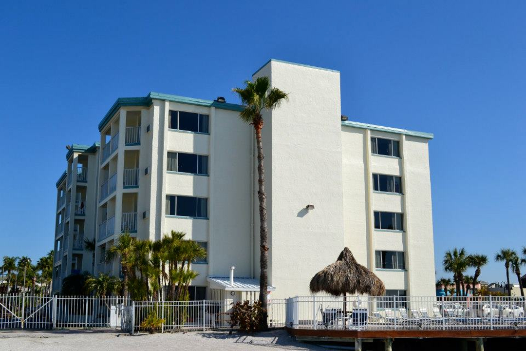 A sunny day and wide shot of Gulfview Hotel On The Beach