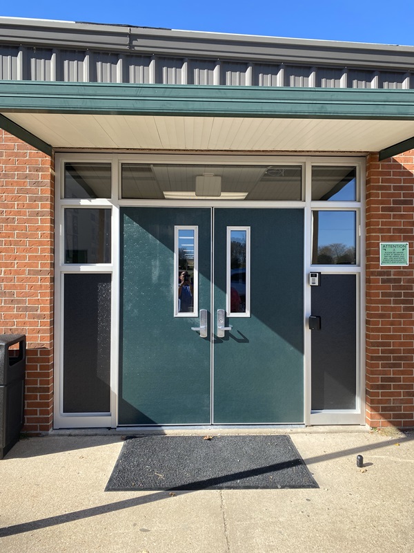 New exterior school doors for Iberia School District, double doors with awning.