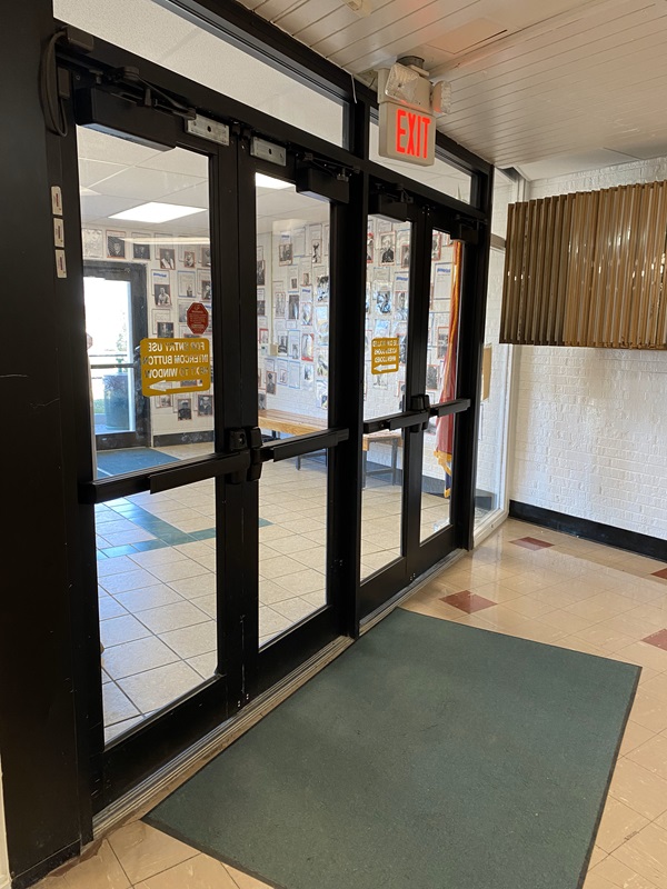 New exterior school doors for Iberia School District, swinging glass panel doors.