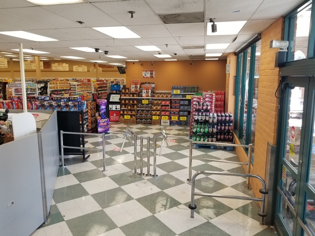 Foot traffic turnstiles inside a grocery store pharmacy