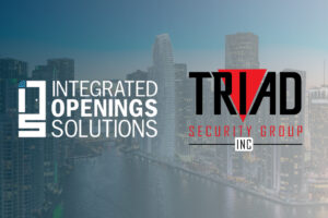 Integrated Openings Solutions logo beside Triad Security Group logo in front of city skyline