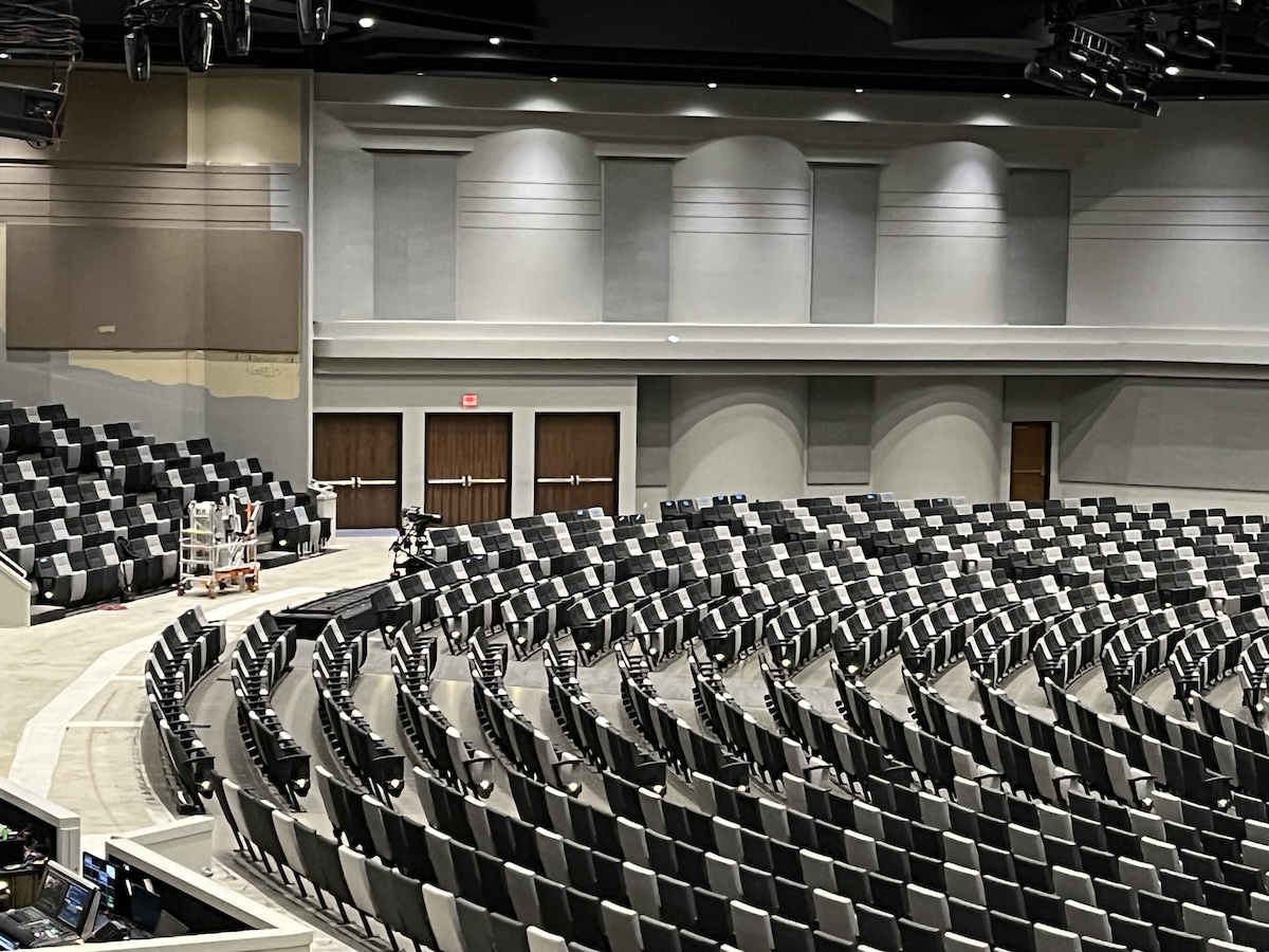 James River Church auditorium with padded seats and brand new wood doors