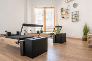 Pilates studio room with reformer beds