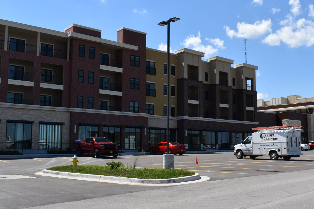 Facade of Summit at West Pryor Multifamily Complex